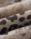 Closeup of vintage wash leopard print fabric on Leopard Vintage Accent Hoodie in Leopard Apricot