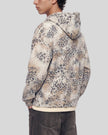 Mid body back angle view of man wearing Leopard Vintage Accent Hoodie in Leopard Apricot