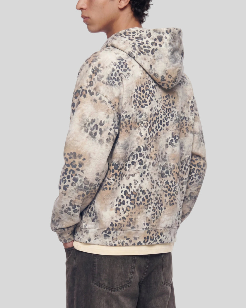 Mid body back angle view of man wearing Leopard Vintage Accent Hoodie in Leopard Apricot