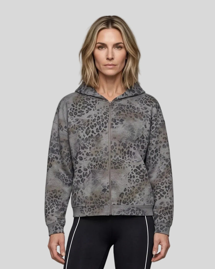 Upper body front view of woman wearing Leopard Vintage Accent Hoodie zipped closed in Leopard Dark Gray