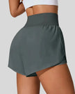 Back view of Athlesi LiftMove Pocket Active Shorts in gray showing smooth waistband and coverage
