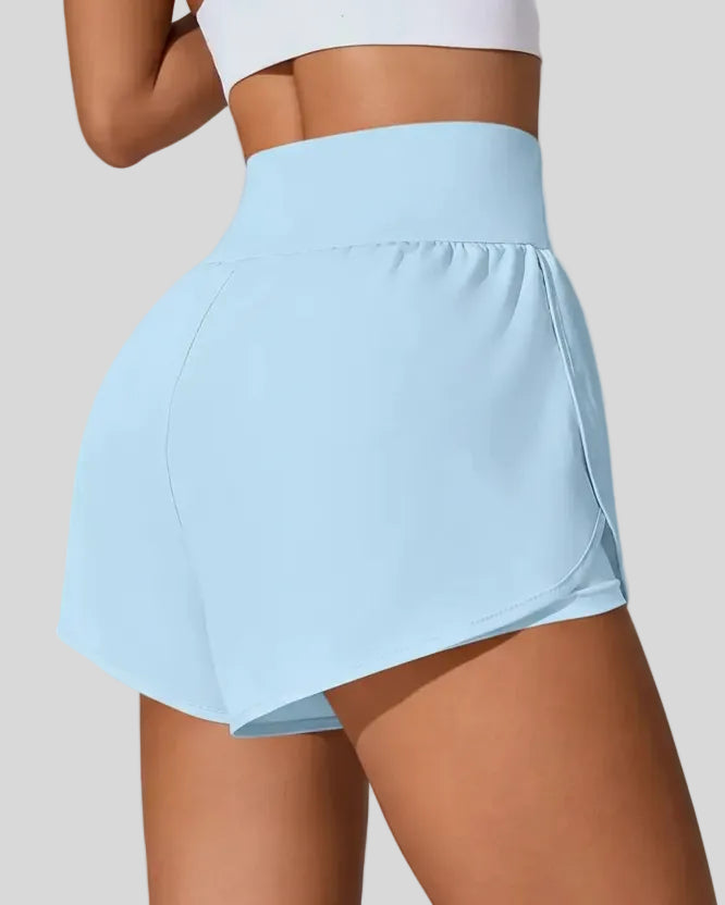 Back view of Athlesi LiftMove Pocket Active Shorts in light blue showing smooth waistband and coverage
