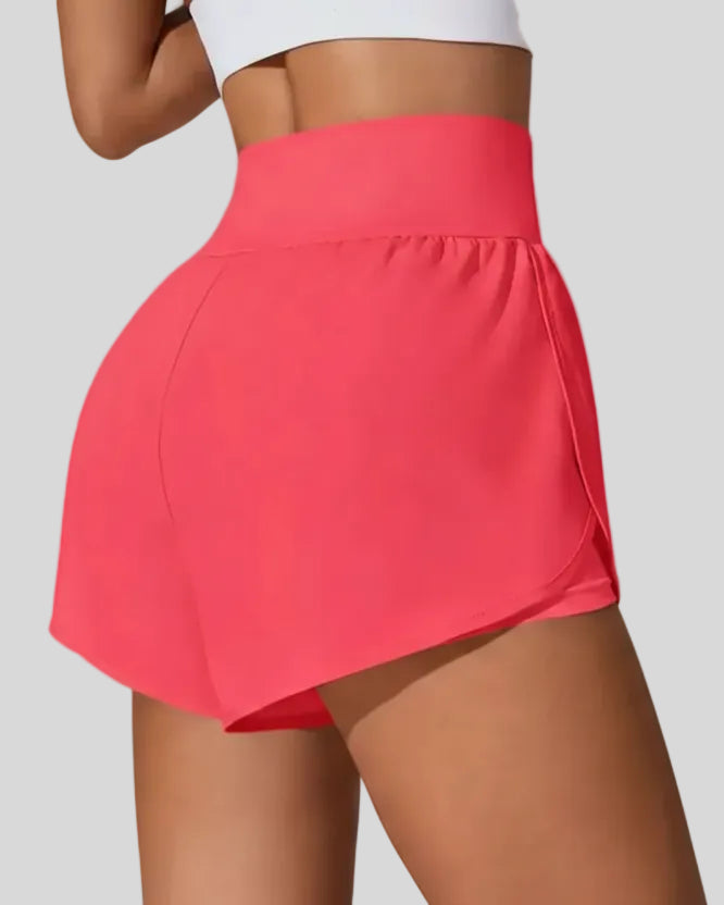 Back view of Athlesi LiftMove Pocket Active Shorts in strawberry showing smooth waistband and coverage