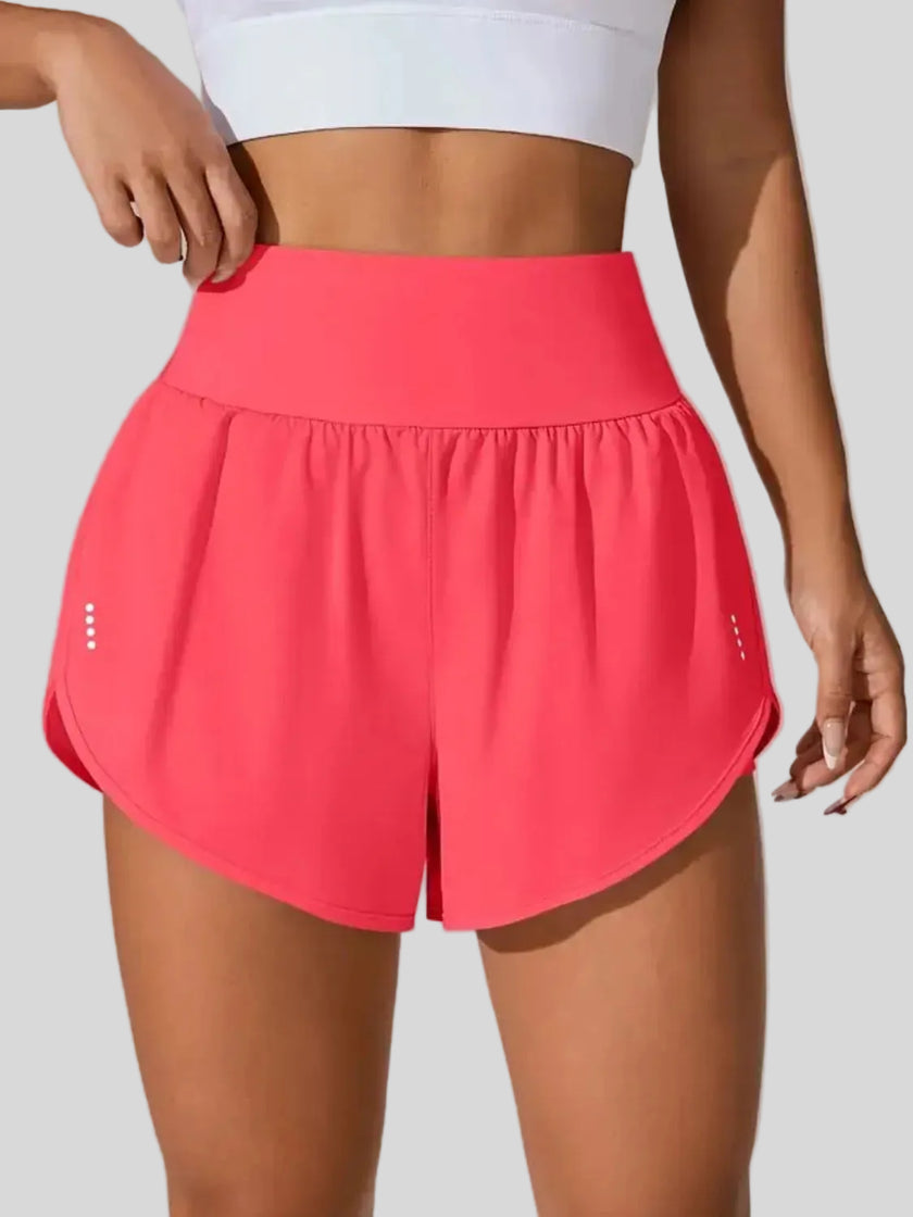 Front view of Athlesi LiftMove Pocket Active Shorts in strawberry with high-rise waistband and relaxed outer layer