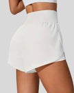 Back view of Athlesi LiftMove Pocket Active Shorts in white showing smooth waistband and coverage