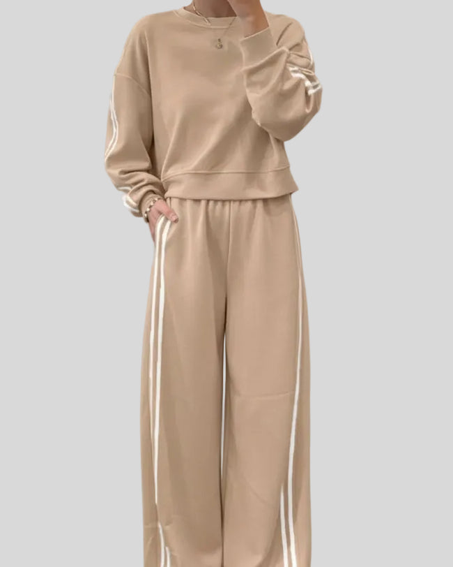 Khaki two-piece lounge set with crewneck top and striped sweatpants, front full body view