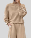 Khaki crewneck lounge top with subtle stripe detailing, upper body close-up