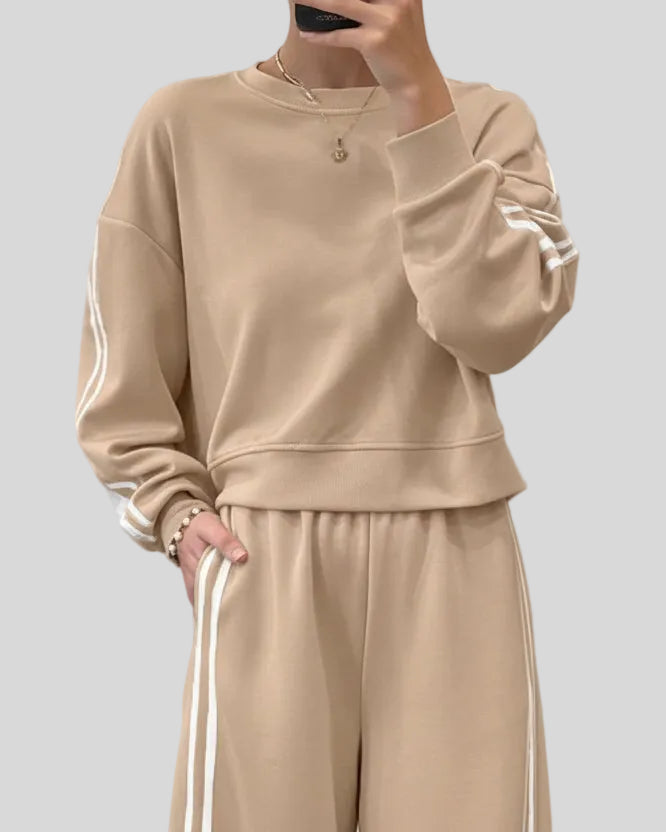 Khaki crewneck lounge top with subtle stripe detailing, upper body close-up