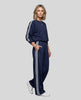 Front angle view of model wearing Athlesi LineFlow Crewneck Lounge Set in Navy