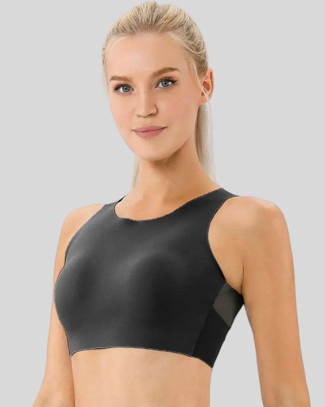 Close-up angled view of Athlesi LineForm Sports Bra in black showing smooth compression fabric