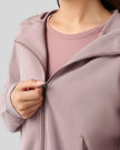 Dusty pink close up highlighting jacket zip up design