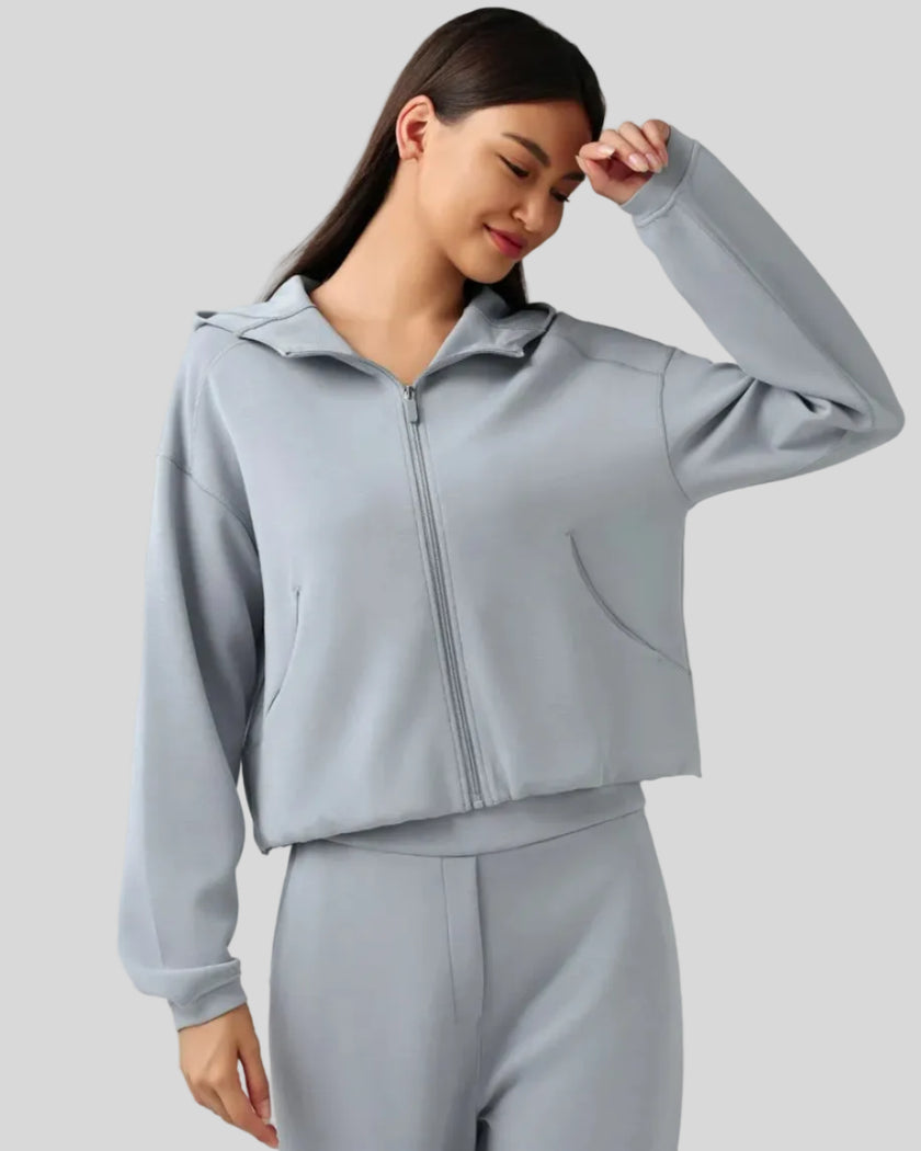 Light blue close up highlighting jacket zip up and pockets design