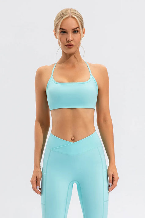 Feminine coverage with LumaForm Crisscross Sports Bra in Aqua - Athlesi