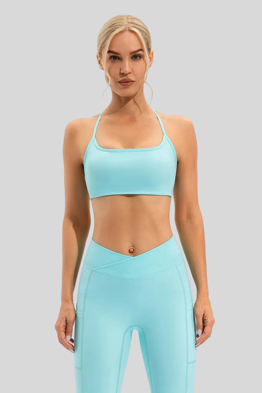 Feminine coverage with LumaForm Crisscross Sports Bra in Aqua - Athlesi
