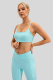 Soft, stretchy performance fabric of LumaForm Crisscross Sports Bra in Aqua - Athlesi