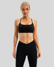 Feminine coverage with LumaForm Crisscross Sports Bra in Black - Athlesi