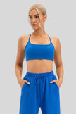Soft, stretchy performance fabric of LumaForm Crisscross Sports Bra in Blue - Athlesi