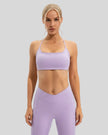 Feminine coverage with LumaForm Crisscross Sports Bra in Lilac - Athlesi