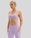 Elevated studio-to-street look with LumaForm Crisscross Sports Bra in Lilac - Athlesi