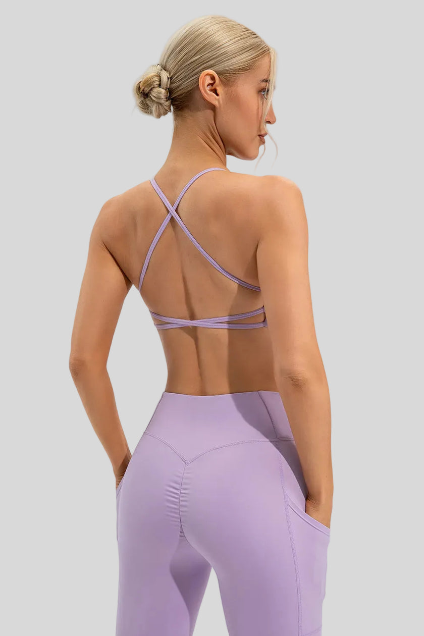 Lilac medium-support sports bra with cross-over back detailing and a smooth finish
