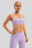 Soft, stretchy performance fabric of LumaForm Crisscross Sports Bra in Lilac - Athlesi