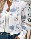 Closeup of floral print and zip-front detail on lightweight sporty jacket