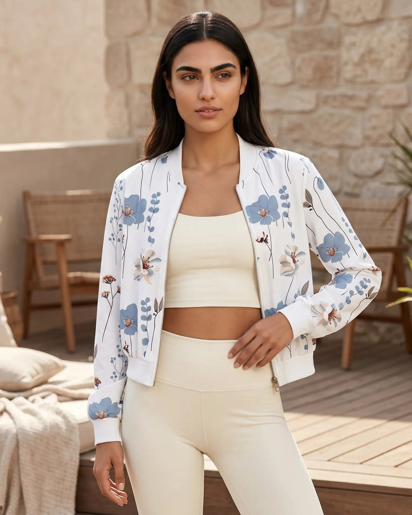 Lifestyle view of floral zip-up jacket styled with leggings for coffee runs travel and everyday movement