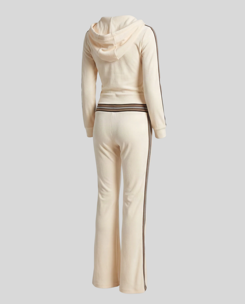 Back view of Monaco Hooded Jumpsuit in Milky White showing hood, striped waistband and wide-leg design