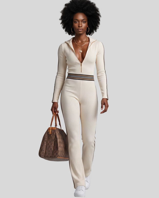 Full body front view of woman styled in Monaco Hooded Jumpsuit in Milky White with elegant wide-leg silhouette