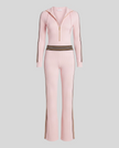 Front view of Monaco Hooded Jumpsuit in Pink with zip neckline, contrast waist stripes and wide-leg silhouette