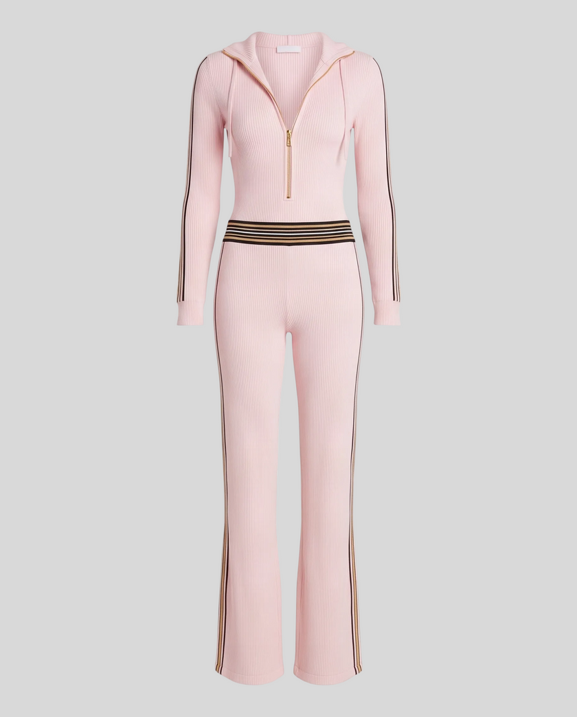 Front view of Monaco Hooded Jumpsuit in Pink with zip neckline, contrast waist stripes and wide-leg silhouette