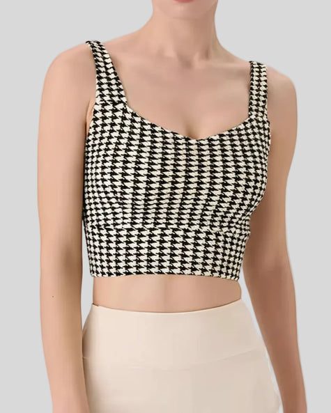Monochic houndstooth sports bra front view with square neckline and cropped fit