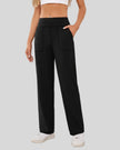 Angled front view of Athlesi MotionEase Relaxed active pant in black