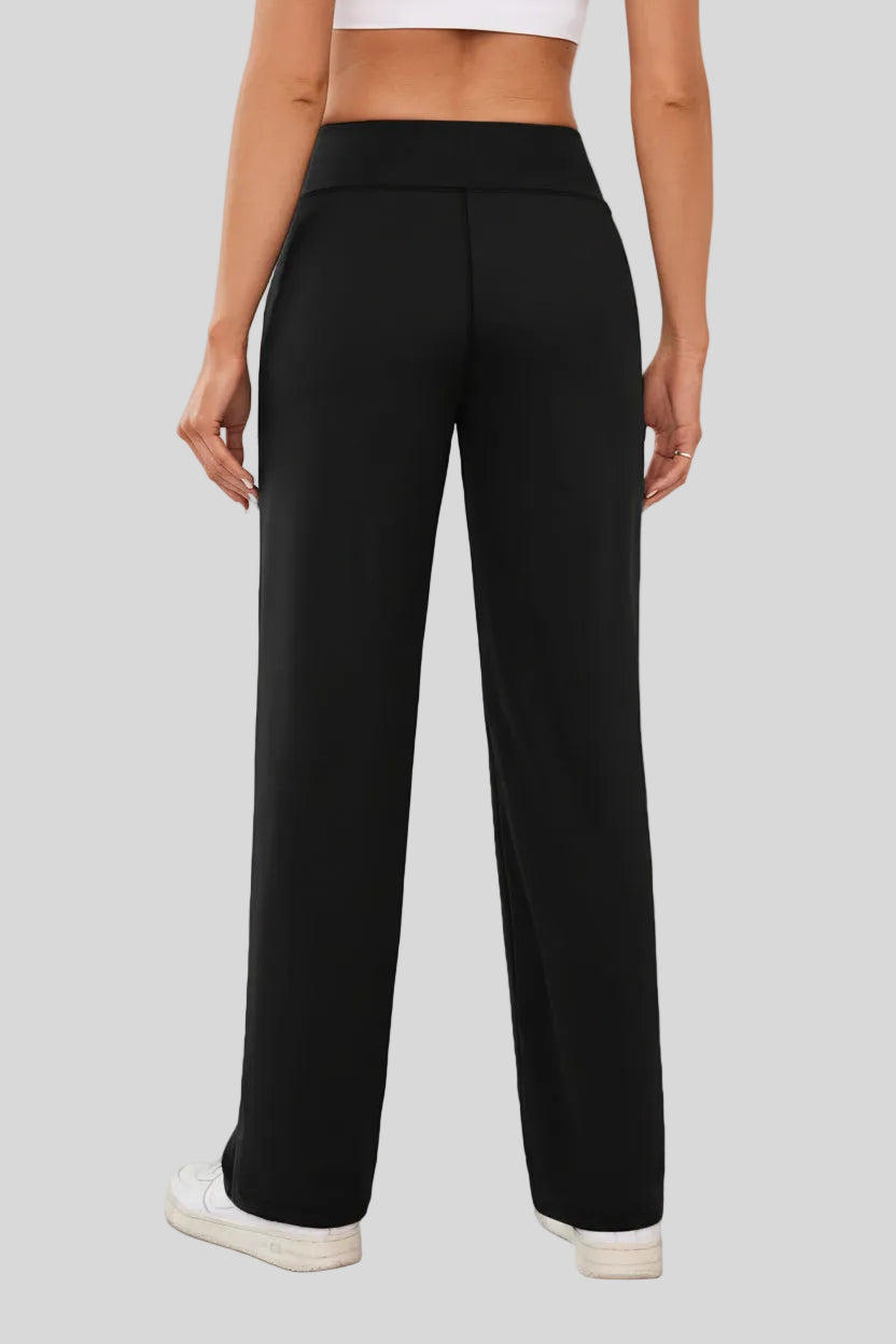 Back view of Athlesi MotionEase Relaxed active pant in black