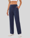 Angled front view of Athlesi MotionEase Relaxed active pant in dark navy