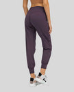 Back view of plum purple Athlesi MotionEase Sculpt Jogger Pant with jogger fit