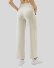 MotionEase Utility Active Pant cream back view with relaxed leg silhouette
