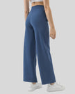 MotionEase Utility Active Pant dusty blue back view with relaxed leg silhouette