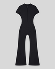 MotionFlow Flared Leg Jumpsuit in Black front view featuring a mock neck, quarter-zip front, and flared legs