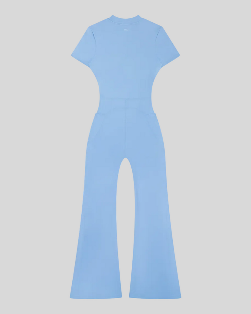 MotionFlow Flared Leg Jumpsuit in Blue back view showcasing the sculpted silhouette and flared leg design