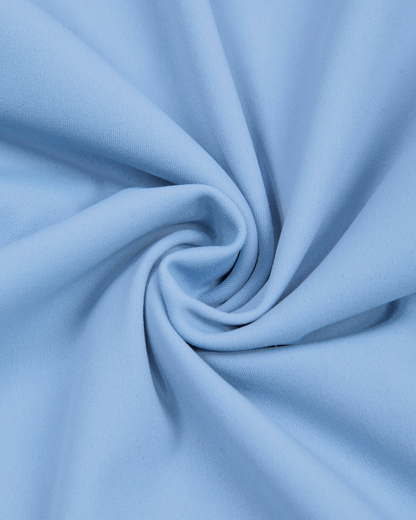 Detailed view of the premium nylon-spandex fabric and stitching on the MotionFlow Flared Leg Jumpsuit in Blue