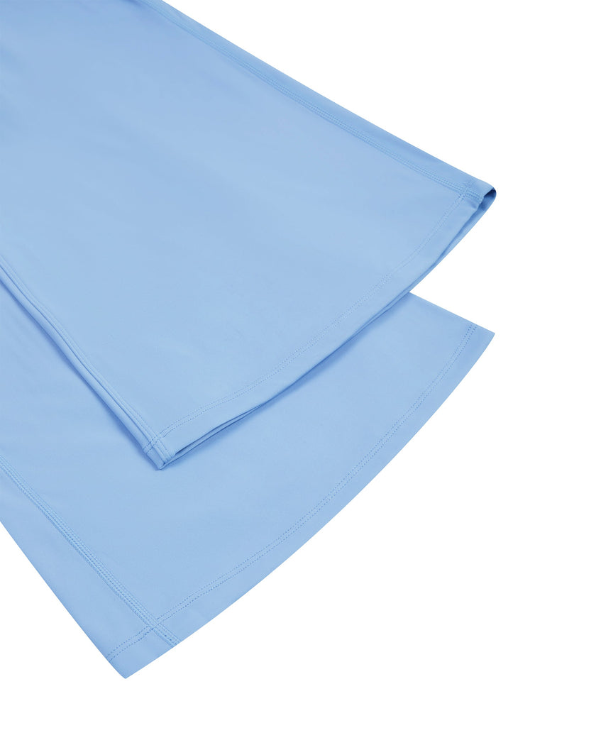 Close-up of the flared leg hem on the MotionFlow Flared Leg Jumpsuit in Blue