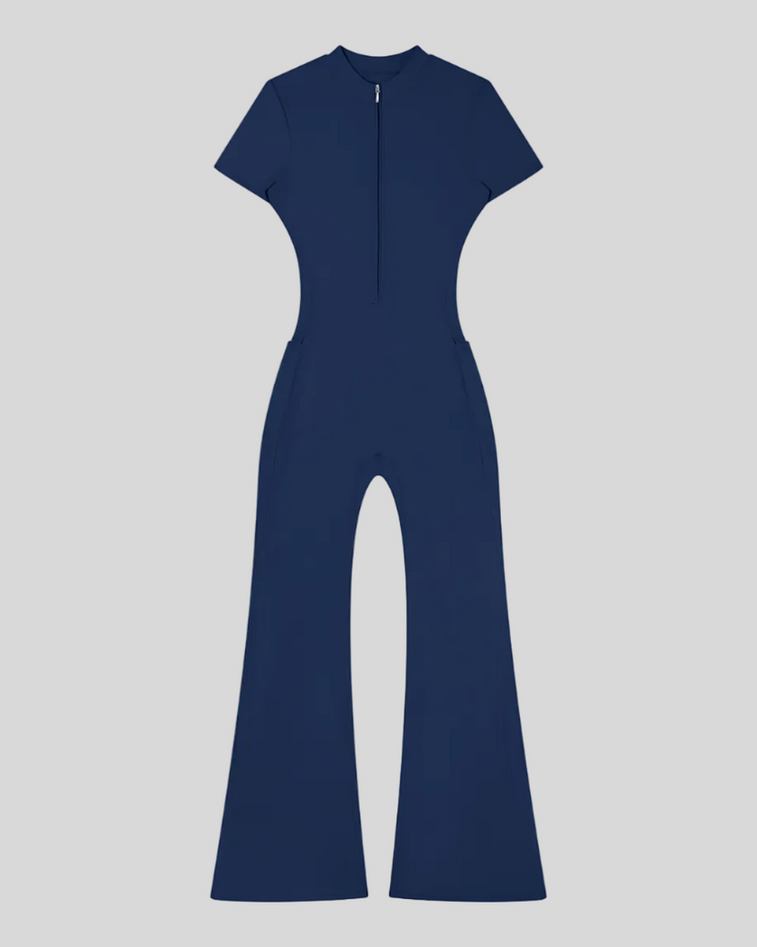 MotionFlow Flared Leg Jumpsuit in Royal Blue front view featuring a mock neck, quarter-zip front, and flared legs