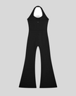 MotionFlow Halter Jumpsuit in Black back view showcasing the open-back halter design and flared legs