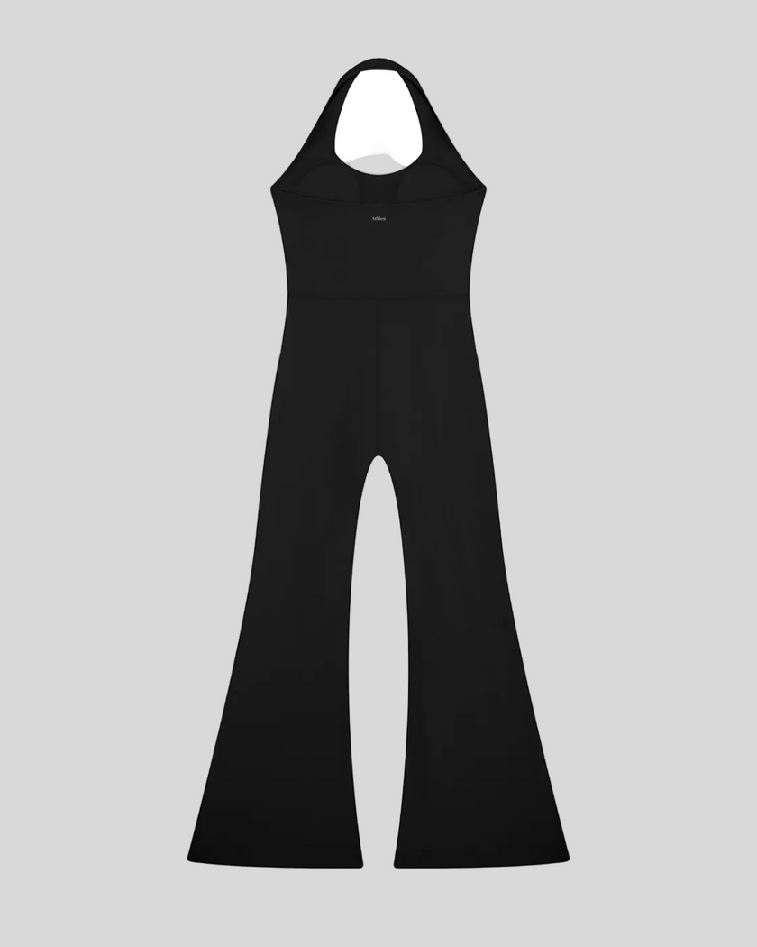 MotionFlow Halter Jumpsuit in Black back view showcasing the open-back halter design and flared legs