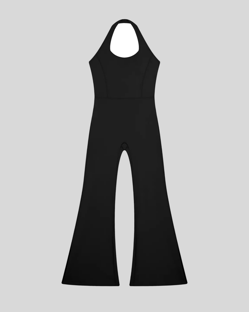MotionFlow Halter Jumpsuit in Black front view featuring a halter neckline and flared-leg silhouette