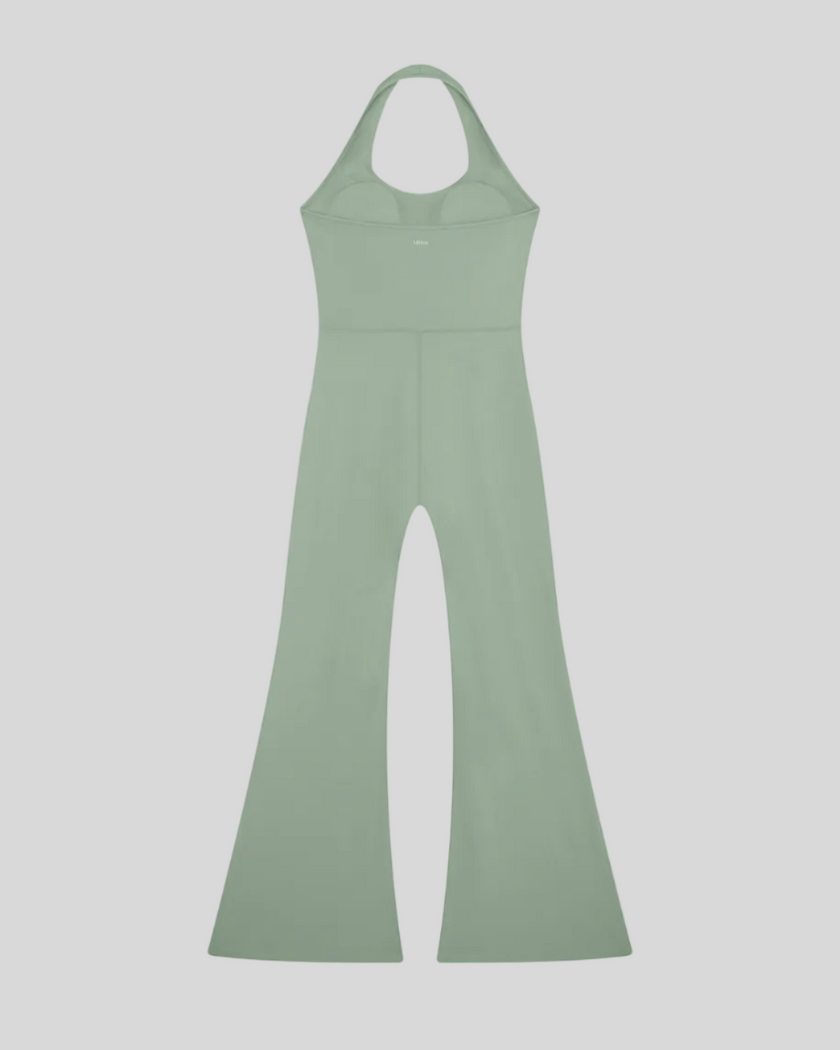 MotionFlow Halter Jumpsuit in Gray Green back view showcasing the open-back halter design and flared legs