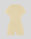 MotionFlow Romper in Apricot back view showcasing the sculpted silhouette and bermuda-length shorts