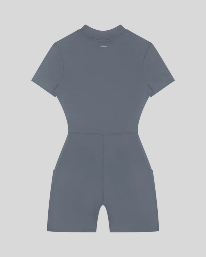 MotionFlow Romper in Gray Blue back view showcasing the sculpted silhouette and bermuda-length shorts