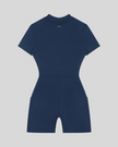 MotionFlow Romper in Navy Blue back view showcasing the sculpted silhouette and bermuda-length shorts